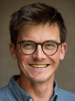 head and shoulders shot of Jamie smiling