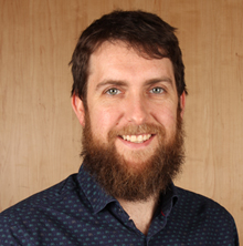 head and shoulders shot of Mark smiling